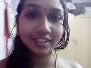 Cornea Tamil ragazza che mostra ai suoi Young man Side